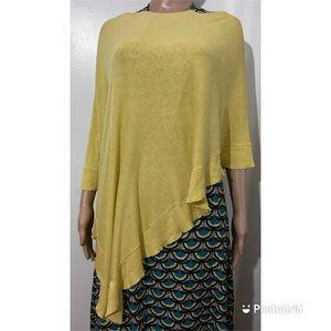 BCBG MAXAZRIA asymmetrical cover poncho. Sits on the shoulders, open under.